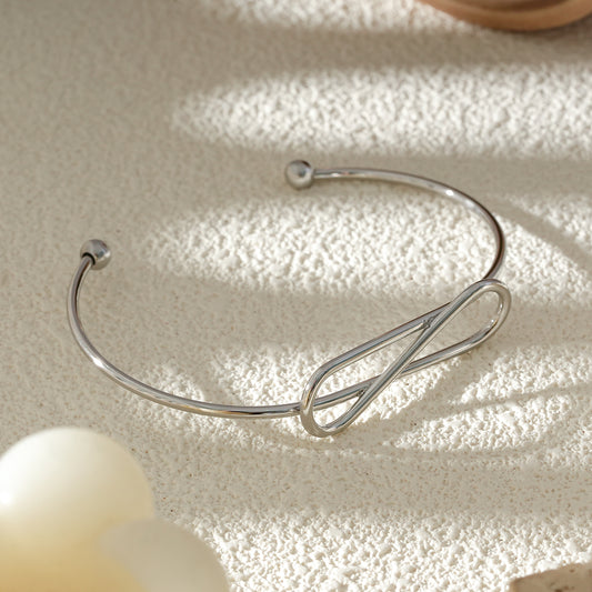 Bracelet Jonc Fin Ouvert Argenté Nœud Infini