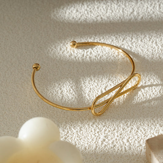 Bracelet Jonc Fin Ouvert Doré Nœud Infini