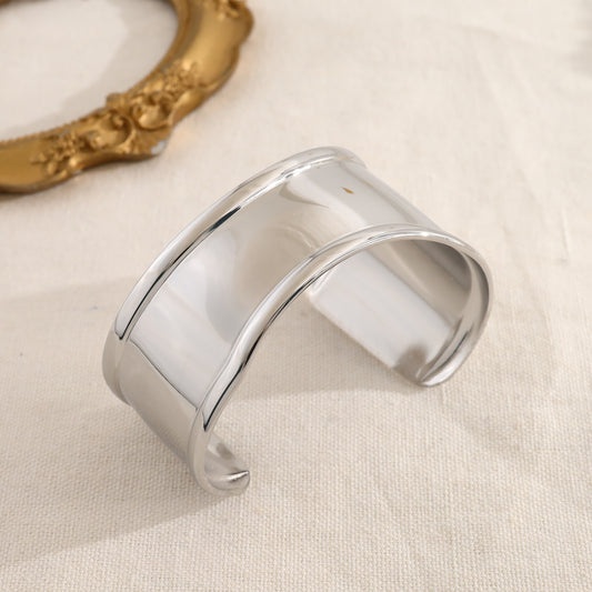 Bracelet manchette argenté effet miroir avec extrémités bombées