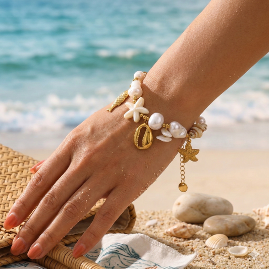 Bracelet doré perles et coquillage, étoile de mer et poisson