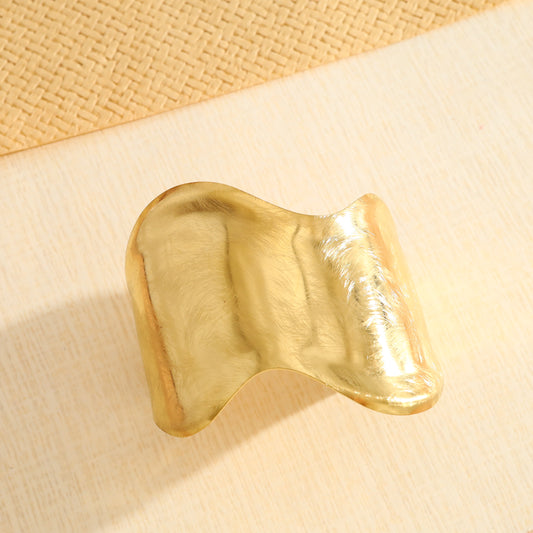 Bracelet manchette vague épais ajustable doré brossé