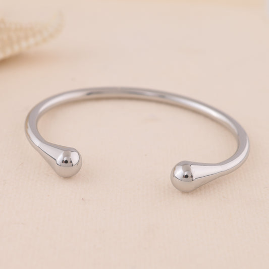 Bracelet jonc fin argenté ouverture avant extrémités bombées