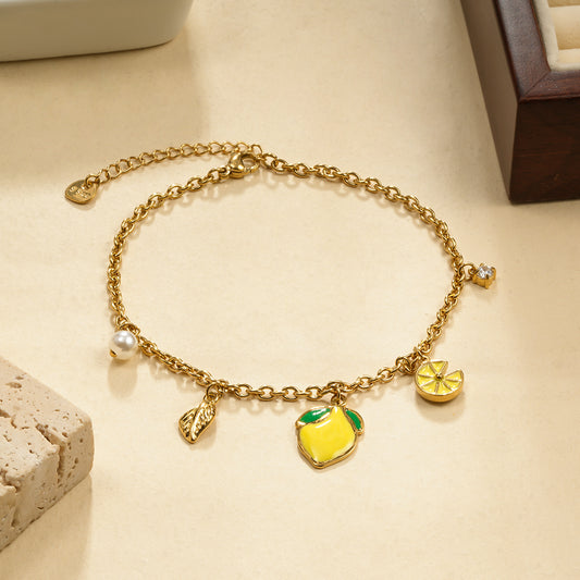 Chaîne de cheville 5 breloques citron jaune