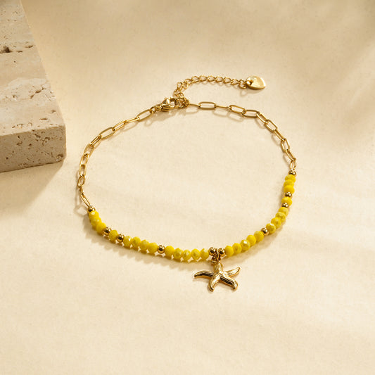 Chaîne de cheville pierres jaunes et étoile de mer