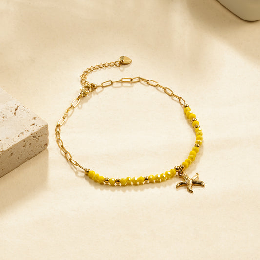 Chaîne de cheville pierres jaunes et étoile de mer