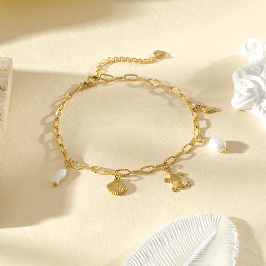 Chaîne de cheville dorée à tortue, coquillage et perles