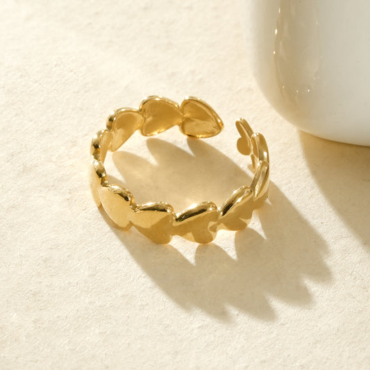 Bague d’orteil dorée ajustable à cœurs lisses