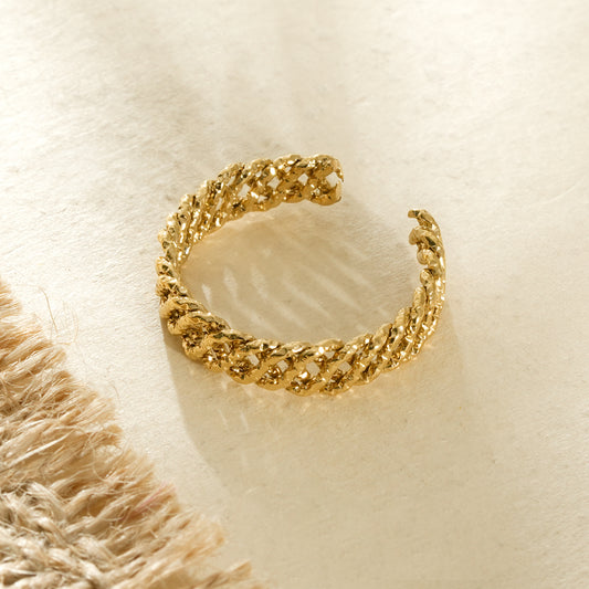 Bague dorée ouverte effet chaîne tressée