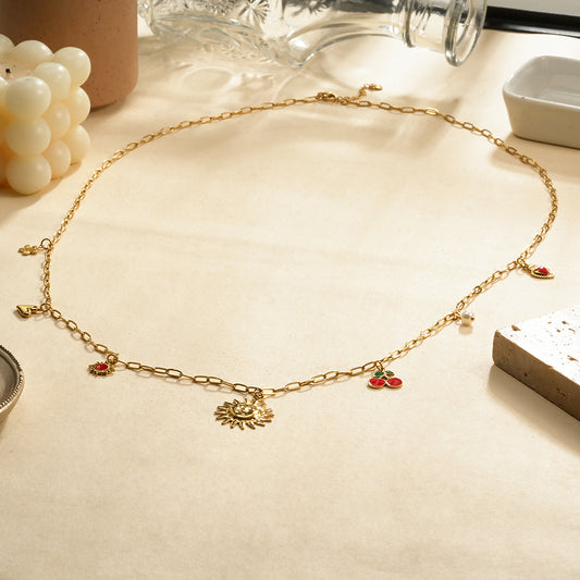 Chaîne de corps breloques soleil et fruits rouges