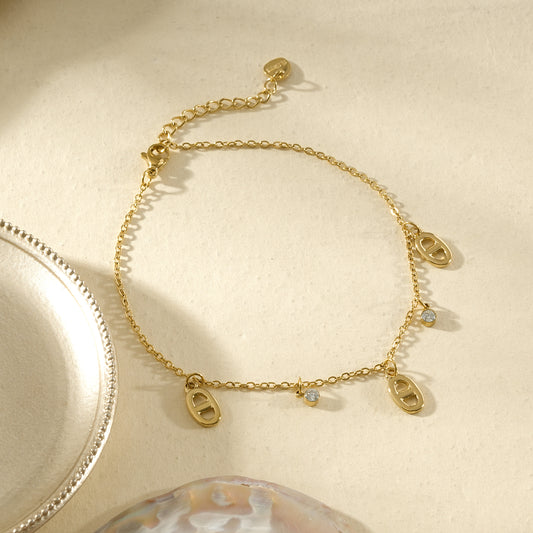 Chaîne de cheville motifs ovales brillants