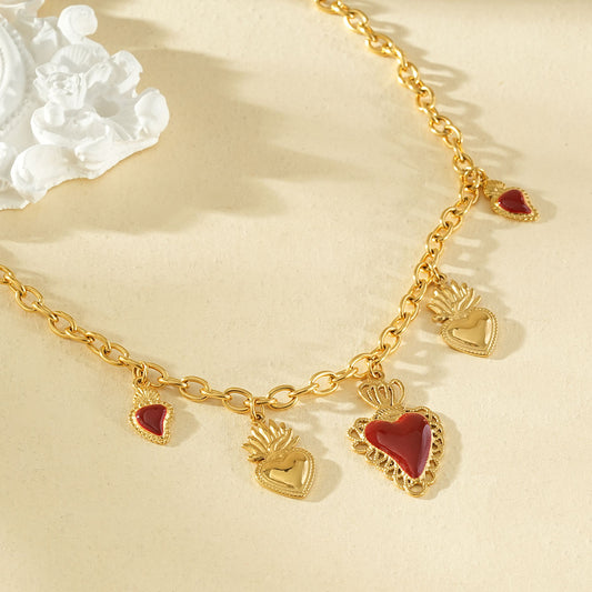 Collier chaîne dorée pendentifs cœurs ex-voto centre émail rouge