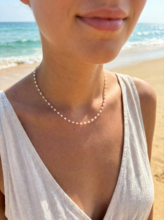 Chaîne de dos ou sautoir dorée en Y ornée de petites perles
