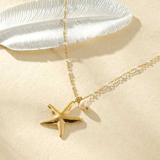 Collier doré chaîne fine pendentif perle et étoile de mer