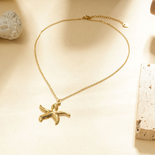 Collier Chaîne Fine Dorée Avec Étoile De Mer Sculptée