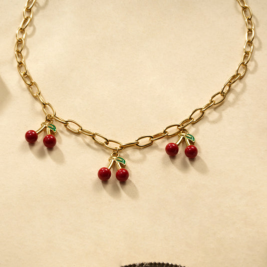Collier chaîne maillons dorés triple cerise