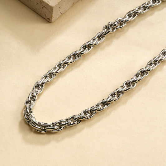 Collier argenté maille gourmette torsadée double brin chaîne épaisse et entrelacée effet miroir