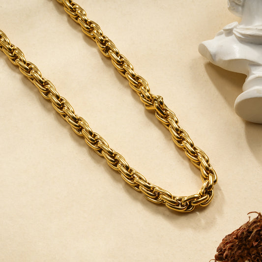 Collier doré maille gourmette torsadée double brin chaîne épaisse et entrelacée effet miroir
