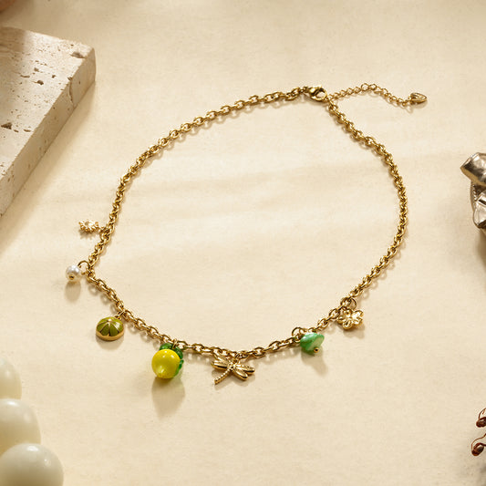 Collier chaîne dorée 7 breloques citron jaune