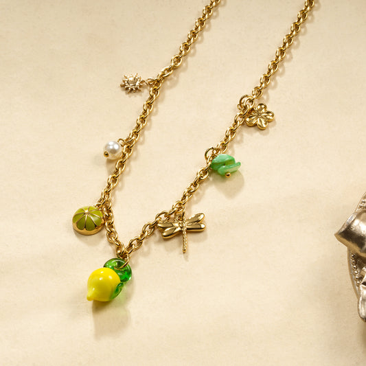 Collier chaîne dorée 7 breloques citron jaune