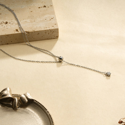 Collier en Y Avec Une et Double Chaîne Argentée Pendentif Strass et Boule Sphère