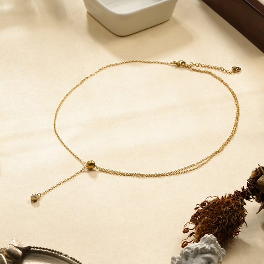 Collier en Y Avec Une et Double Chaîne Dorée Pendentif Strass et Boule Sphère