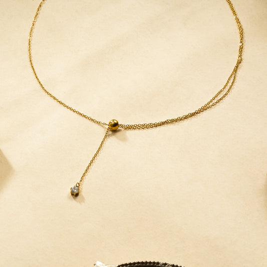 Collier en Y Avec Une et Double Chaîne Dorée Pendentif Strass et Boule Sphère