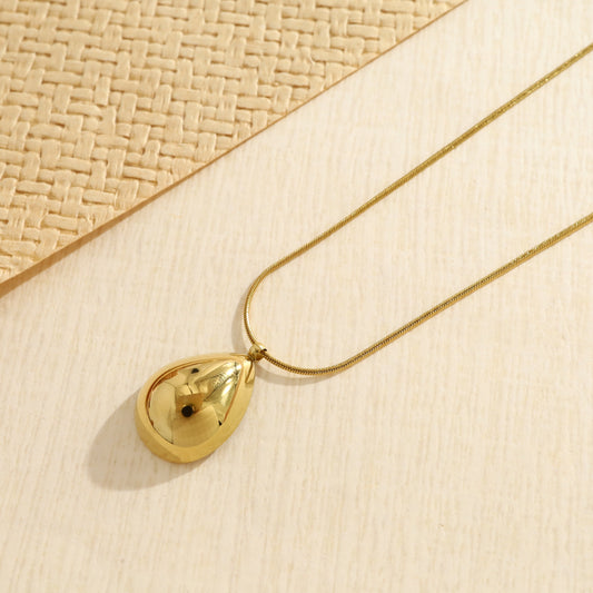 Collier doré chaîne maille serpent ronde pendentif goutte bombé lisse