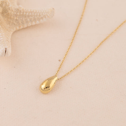 Collier doré chaîne fine avec pendentif goutte effet miroir