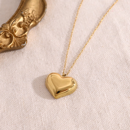 Collier doré fin avec pendantif cœur bombé effet miroir