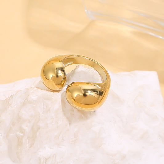 Bague argentée ouverture sur le devant avec formes arrondi effet miroir