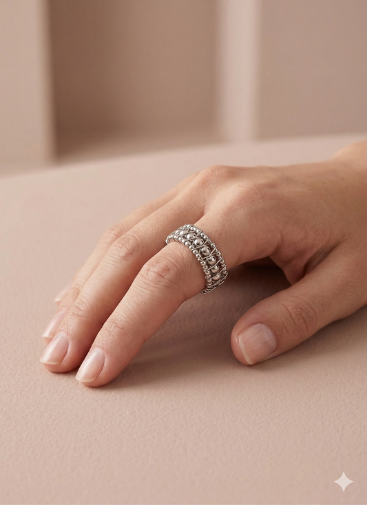 Bague ajustable argentée maillage sculptée