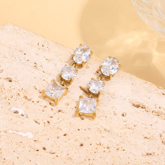 Boucles d’oreilles argentées strass pendantes