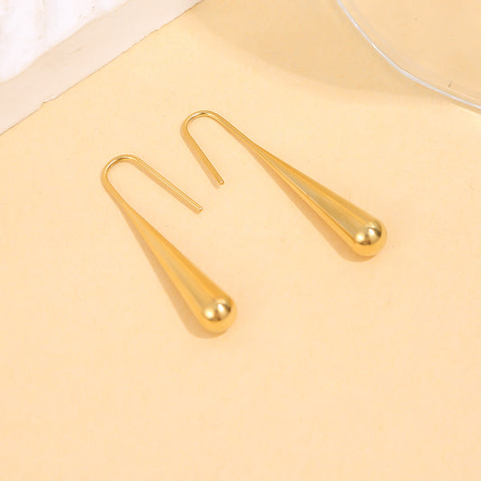 Boucles d'oreilles dorées en forme de larme allongée