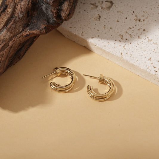 Boucles d'oreilles dorées créoles ouvertes triple branches