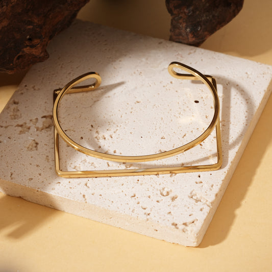 Bracelet doré double jonc entrelacé rond et rectangulaire