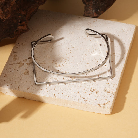 Bracelet argenté double jonc entrelacé rond et rectangulaire