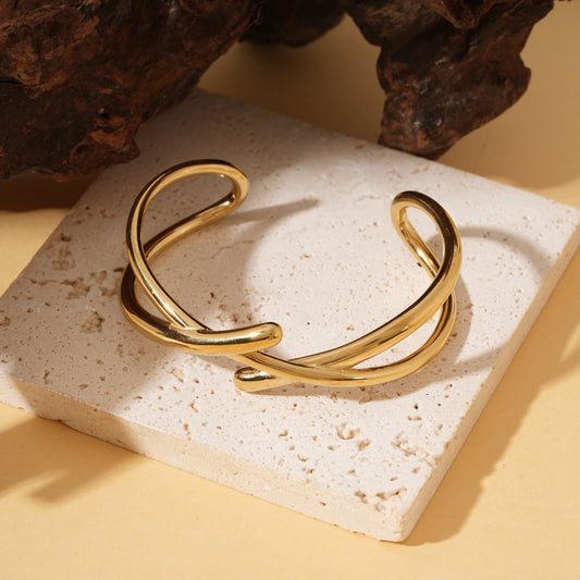 Bracelet jonc ajustable doré à branches croisées