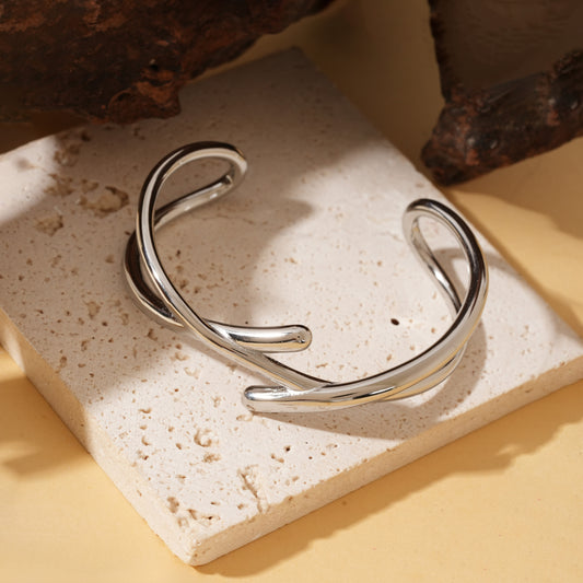 Bracelet jonc ajustable argenté à branches croisées