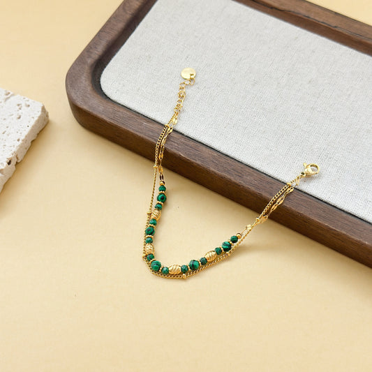 Bracelet double chaîne pierres malachite synthétiques et dorées texturés