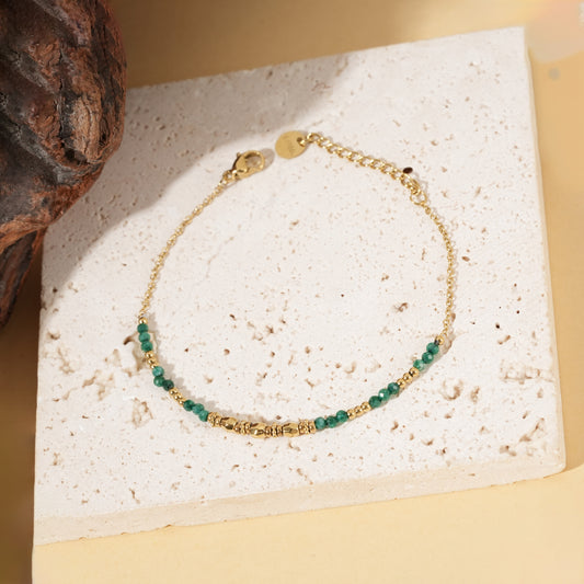 Bracelet doré chaîne fine perles malachite synthétique et billes dorées