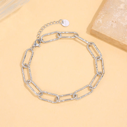 Bracelet chaîne argentée maillons texturés allongés effet pailletté