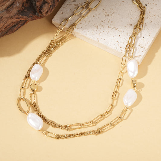 Collier sautoir doré multi chaîne texturées ornés de perles