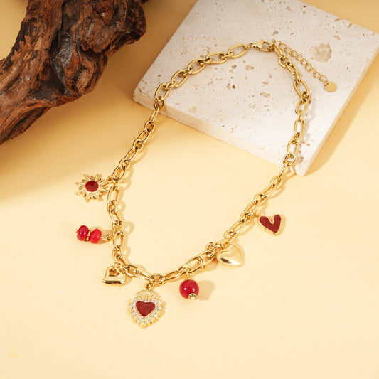 Collier chaîne dorée pendentifs cœurs ex-voto perles rouge