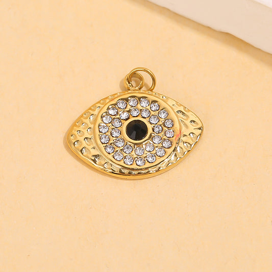 Lot de 3 pendentifs dorés œil strass noir