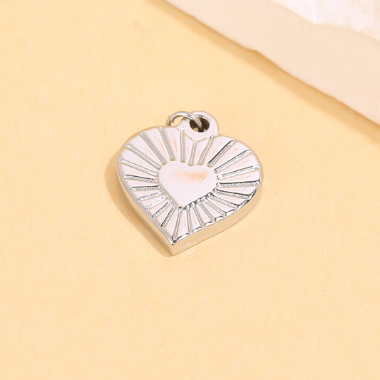 Lot de 3 pendentifs argentés cœurs dans cœurs