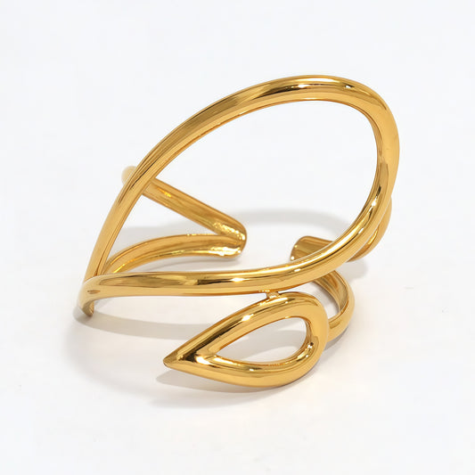 Bague dorée ajustable motif feuilles ajourées