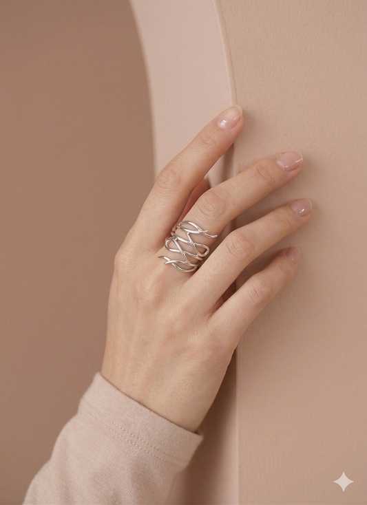 Bague ajustable ajourée entrelacée