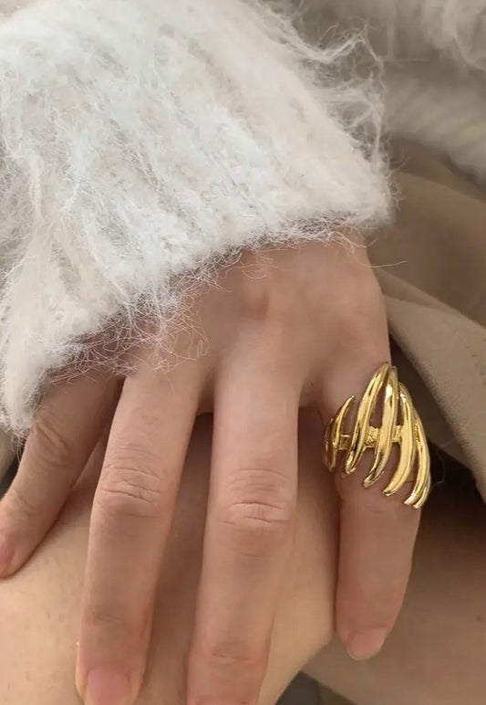 Bague ajustable dorée épaisse multi-branches sculpturales