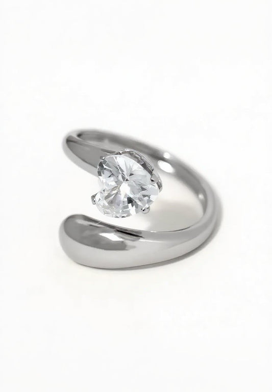 Bague ajustable argentée ouverte ornée d'un strass cœur
