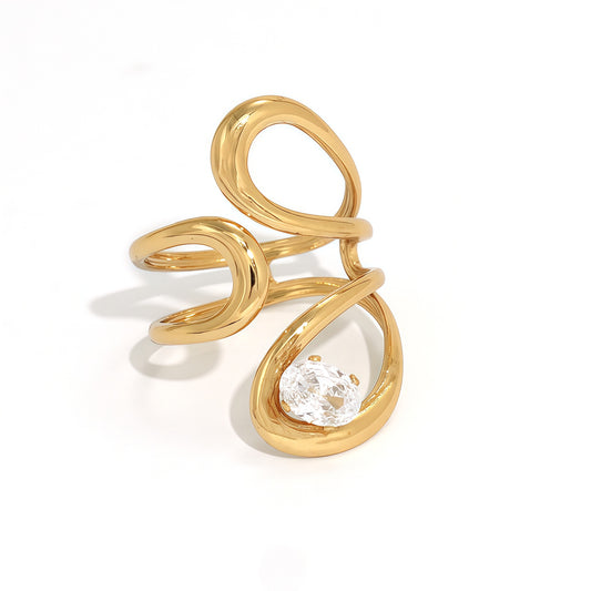 Bague dorée ajustable ajourée design abstrait strass ovale